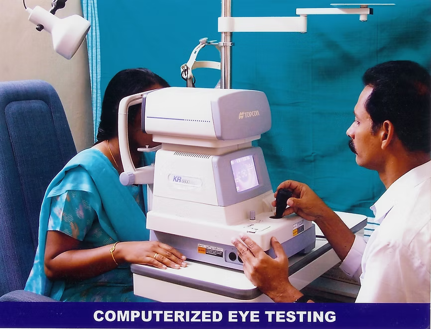 Doctor performing computerized eye test